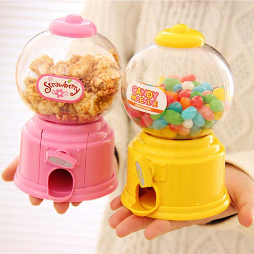 Small gumball-style candy dispenser in vibrant colors.